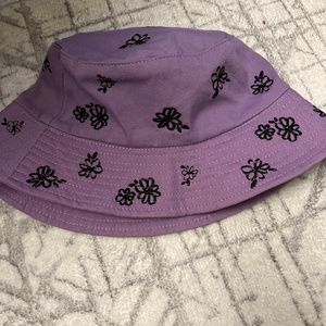 purple buckethat with black flowers